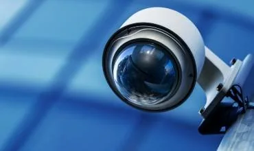 Close-up of a surveillance camera lens