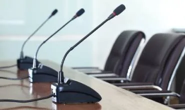 Conference microphones in a meeting room